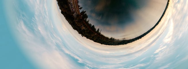A 360 degrees panoramic picture of a beach looking like a fisheye